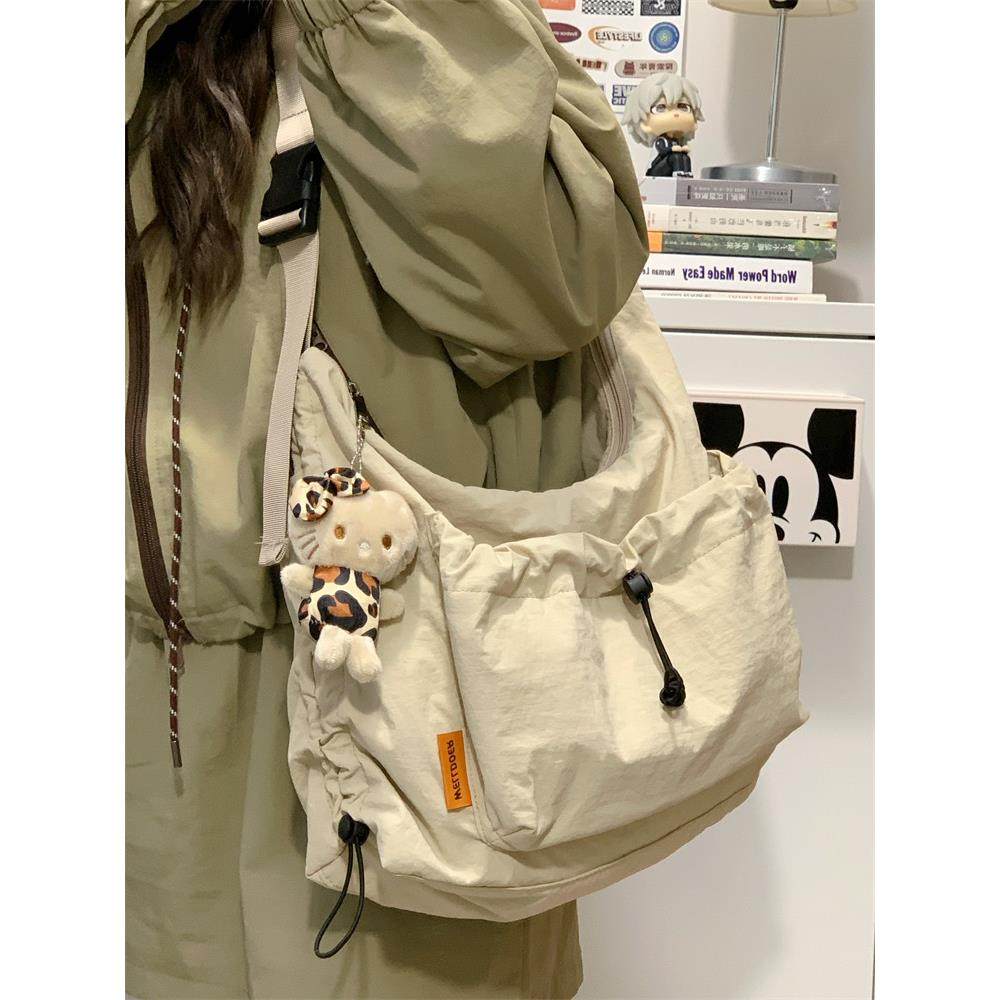 泡芙包小众设计褶皱抽绳帆布包大容量轻便通勤单肩斜挎包休闲布包,箱包皮具/热销女包/男包,时尚帆布包,淘宝优惠券,粉丝福利购,淘宝优惠卷