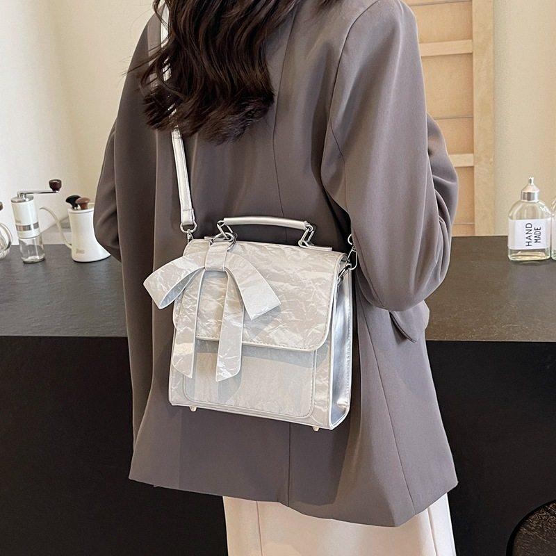 高级感背包女士双肩包2025新款时尚纯色质感夏季双肩背包手提书包