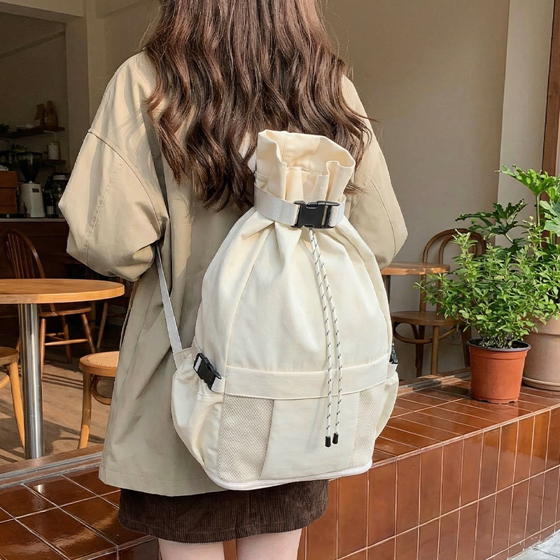 女款抽绳大容量轻便旅行双肩包