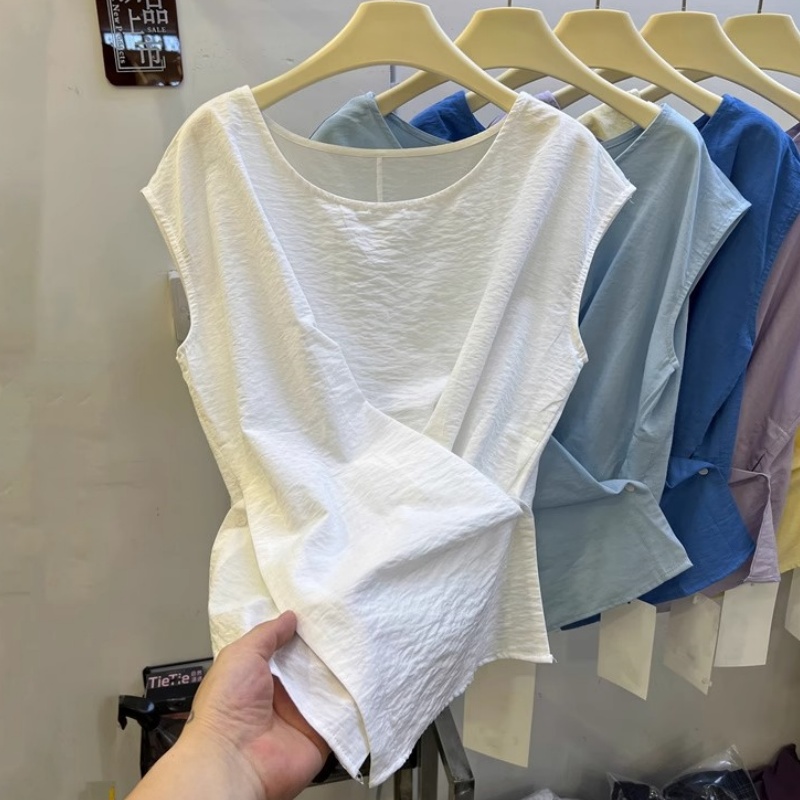 不规则交叉斜扣下摆衬衫女夏