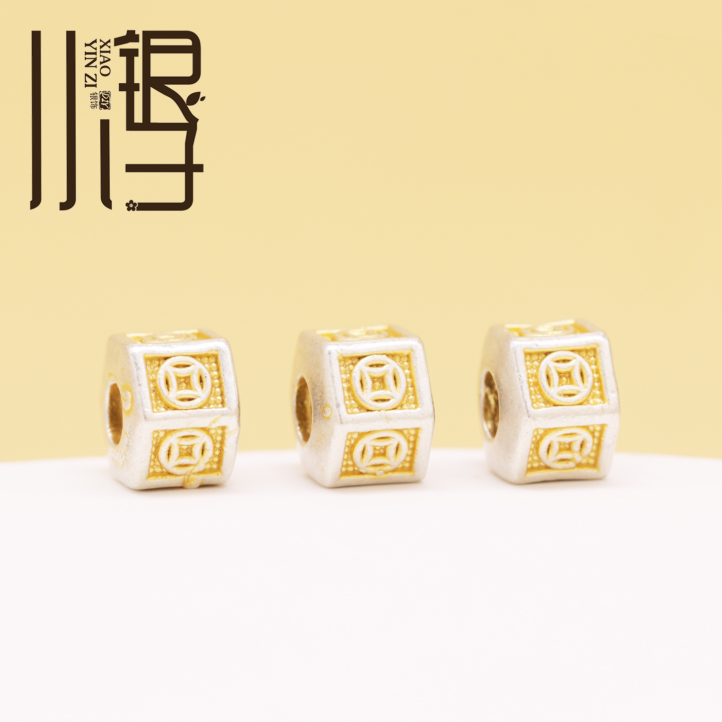 S999纯银描金铜钱纹六面体桶珠