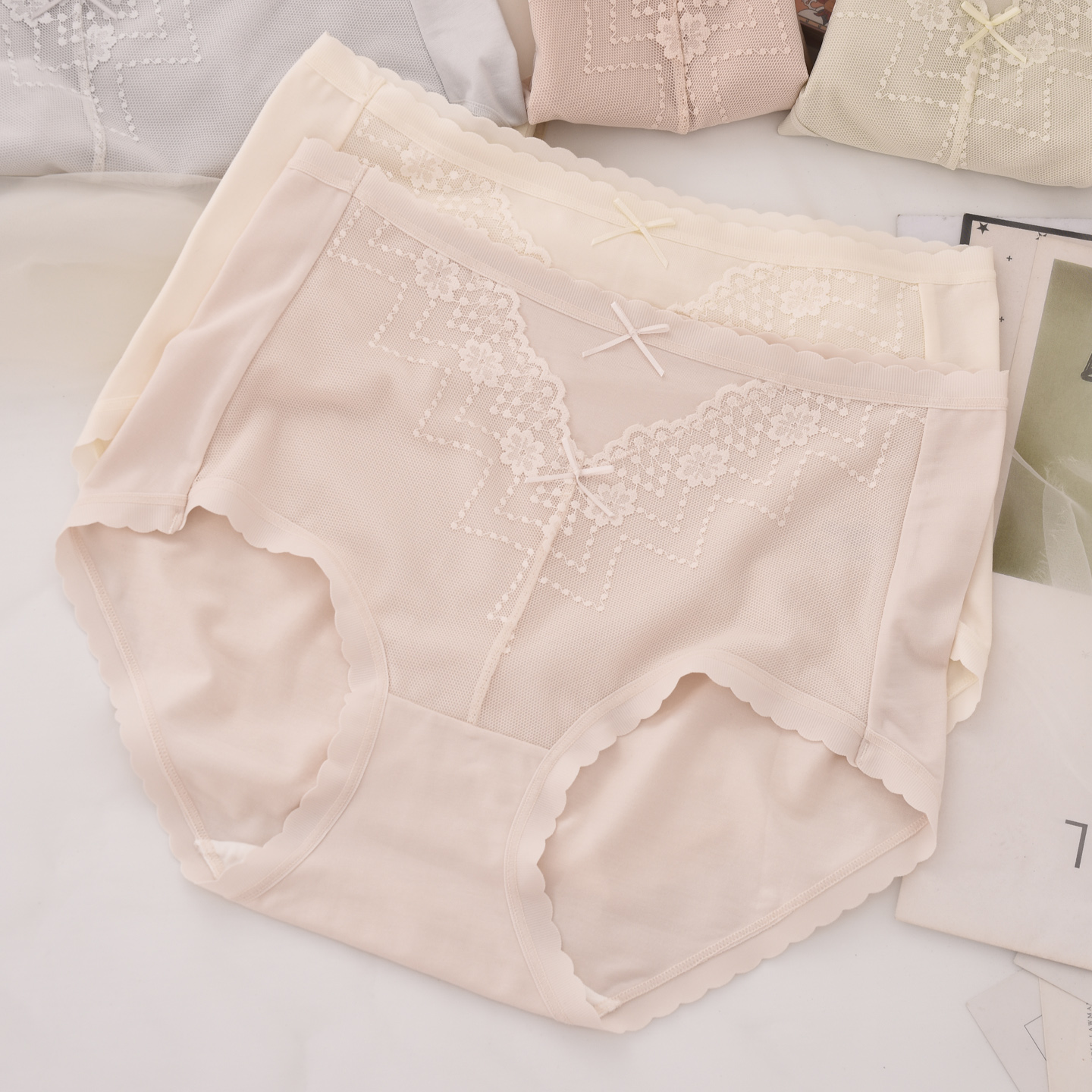 桑蚕丝抑菌底裆莫代尔中腰内裤女蕾丝边蝴蝶结包臀大码胖MM三角裤