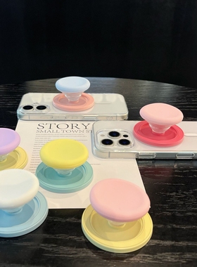 马卡龙撞色磁吸气囊手机支架magsafe吸附式背贴桌面支撑气垫可折叠伸缩手机架配件适用苹果16promax15pro14女