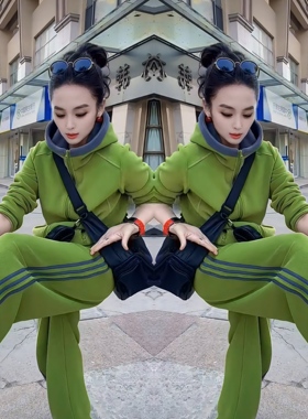 2025冬季绿色年轻靓丽连帽小众休闲运动上衣搭配高腰条纹直筒裤女