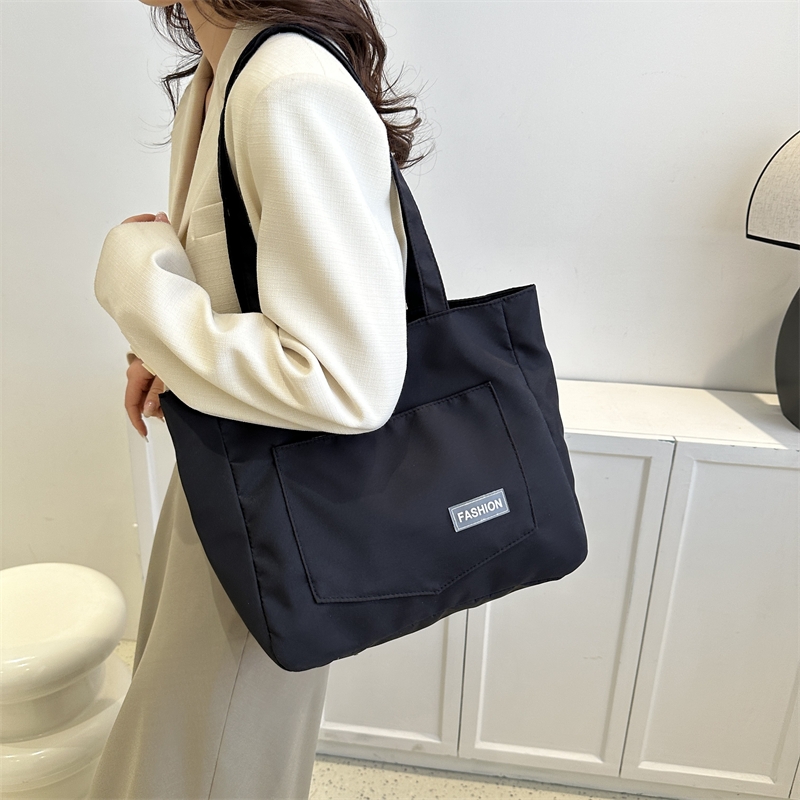 大容量帆布包包女士单肩手提包上班通勤时尚大包托特包学生补习袋