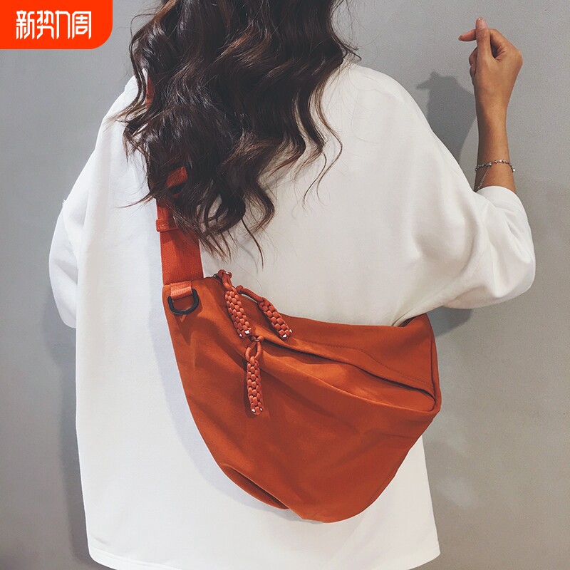 简约帆布包女2025新款户外运动旅游防水轻便大容量胸包通勤斜挎包