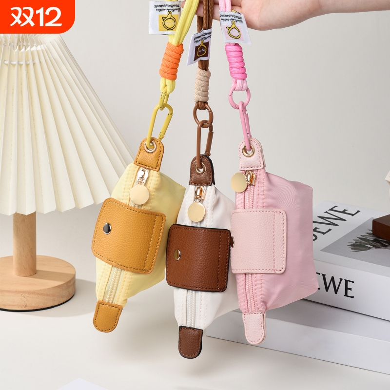 2025新款小众设计迷你饺子包收纳零钱口红耳机包钥匙扣礼物挂件包