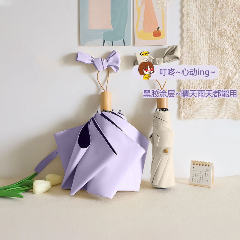 天堂伞手动雨伞高颜值简约仿木纹晴雨伞黑胶防紫外线遮阳伞太阳伞图片