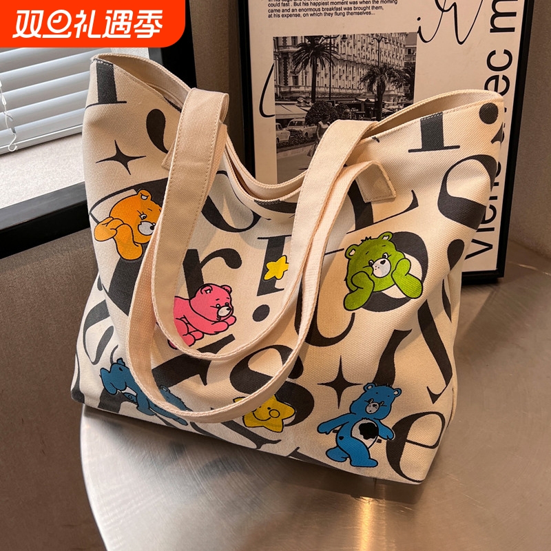 学生帆布包女大容量托特包2024新款百搭妈咪包手提单肩购物袋小包