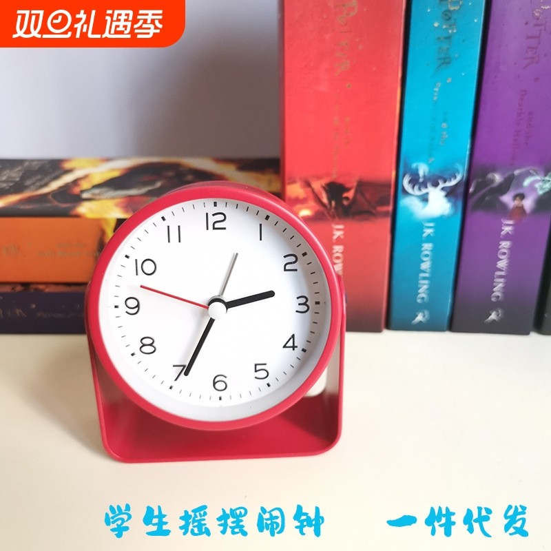 创意金属闹钟  可以拿着玩的摇摆小转钟  静音带闹钟3寸床头座钟