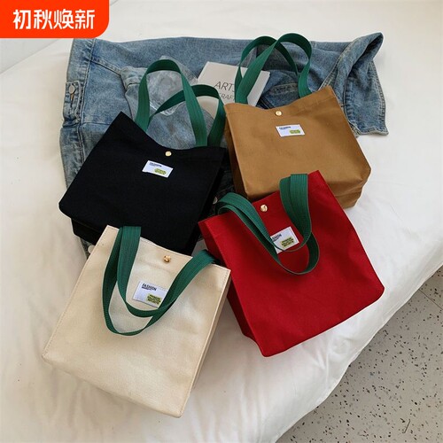 简约百搭纯色帆布手提包包女2026韩版上班小拎包休闲便当手拎布包