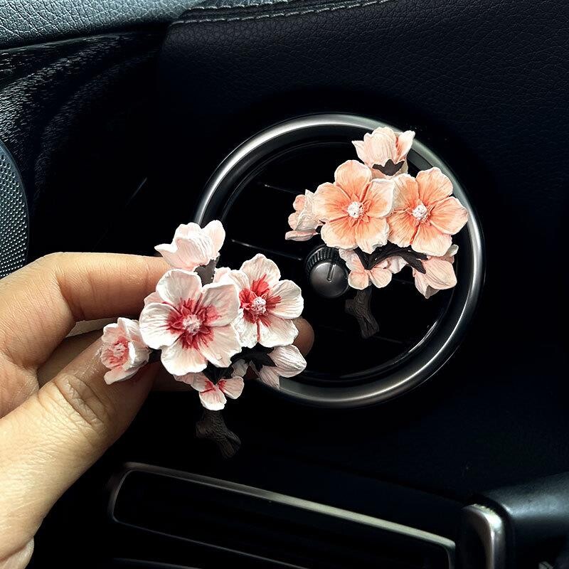 梅花车载香薰香水扩香石出风口装饰车内饰品摆件香氛汽车内饰用品