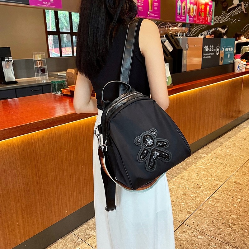 牛津布双肩包女新款超火时尚背包休闲百搭单肩两用包旅游包