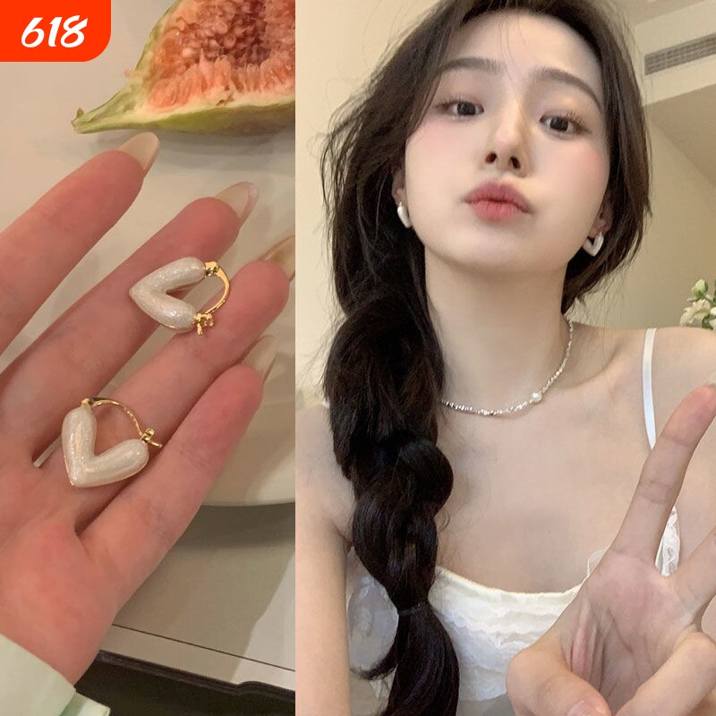 白色爱心耳环女爆款高级感耳钉小众设计轻奢耳坠耳流苏花朵珍珠花