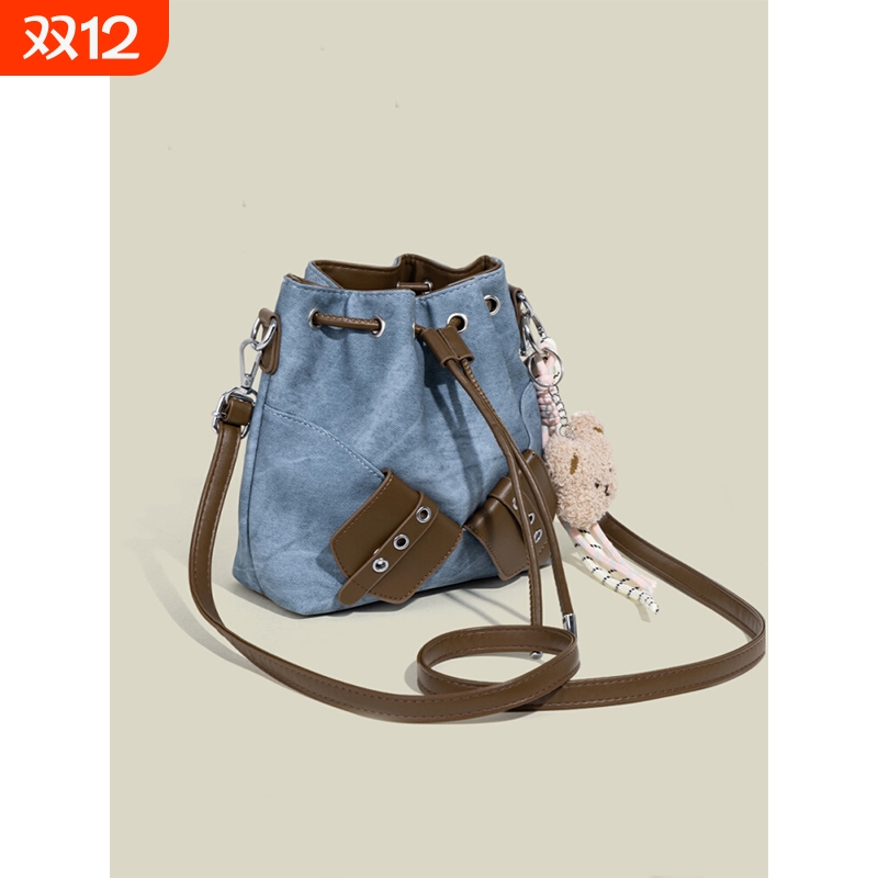 伊布古奇褶皱手提水桶包包女2025新款时尚高级感小众通勤斜挎女包