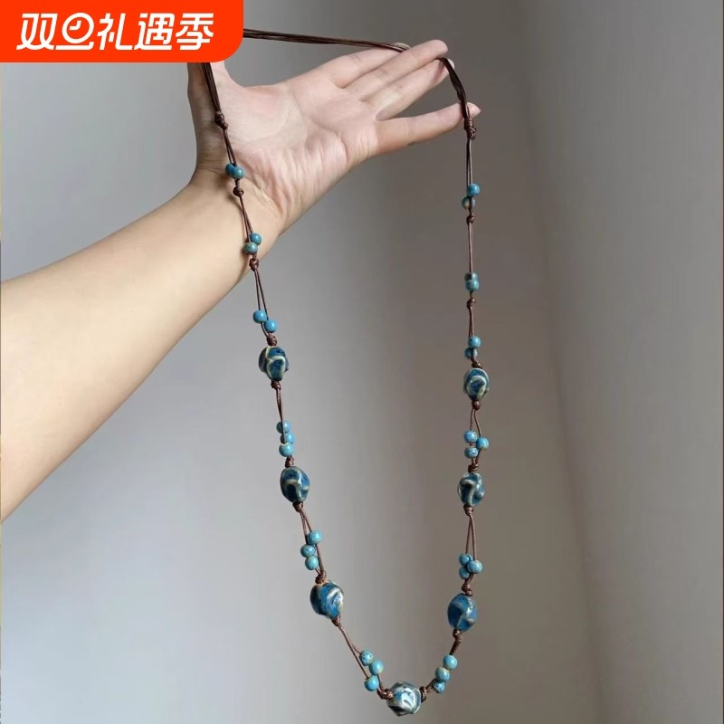 民族风小众蓝色编织串珠项链女编织吊坠长款毛衣链高级颈链配饰