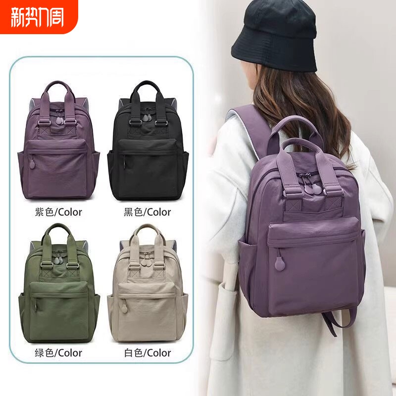 金玉鸟女士双肩包新款时尚百搭旅行背包轻便小书包紫色简约黑色