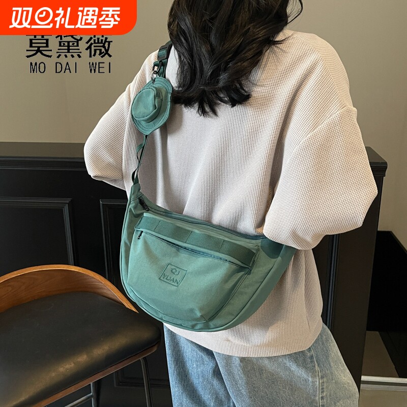 莫黛薇时尚大容量新款时尚休闲单肩百搭学生潮流斜挎通勤饺子包