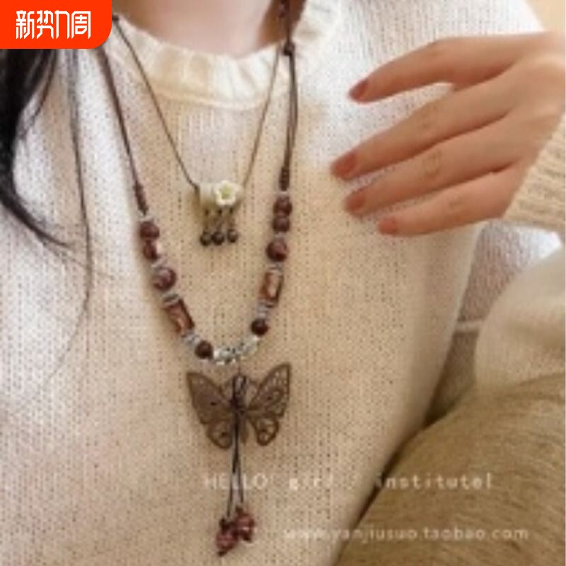 族吉复古民族风陶瓷蝴蝶铃铛吊坠项链女新款潮长款毛衣链女配饰品