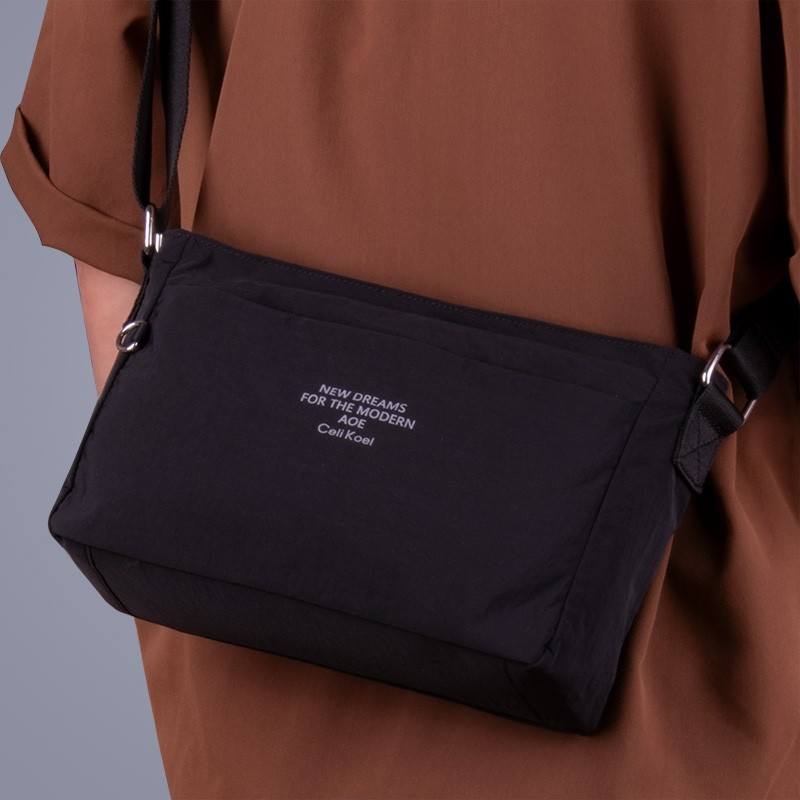 德国男士单肩包运动休闲斜挎包男款背包横款帆布小包大容量便携包