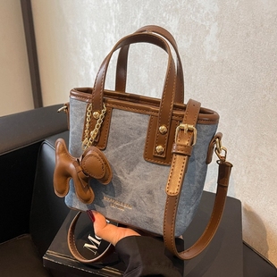 伊布古奇水桶包包女2025新款秋冬百搭单肩斜挎包爆款手提包蓝色