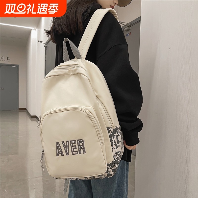 新款休闲双肩包男女初中高中生大学生书包简约大容量背包书包