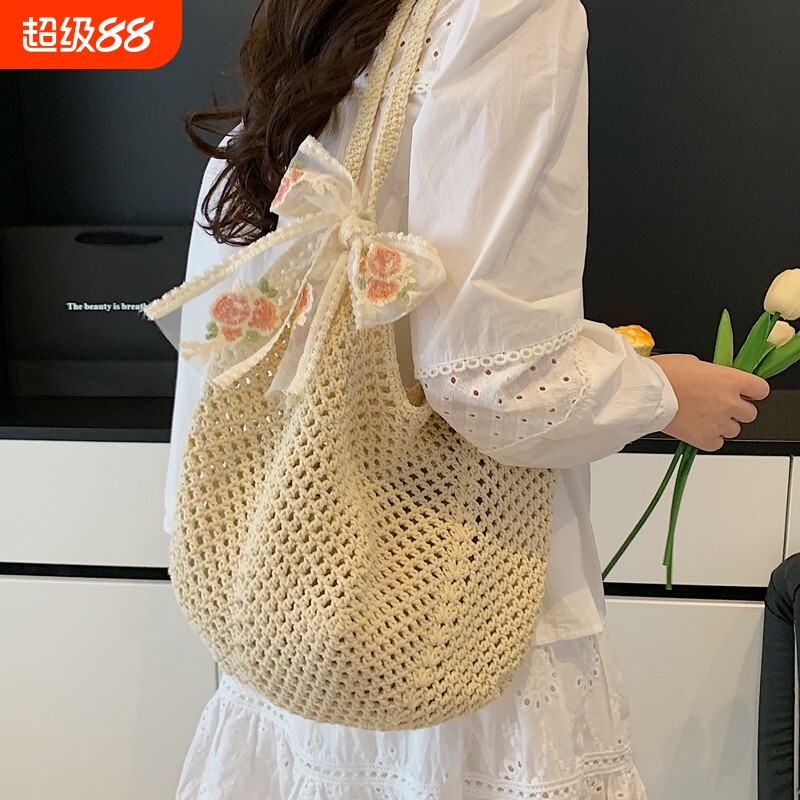 镂空手工编织包女夏季休闲慵懒风大容量草编包海边度假单肩沙滩包图片