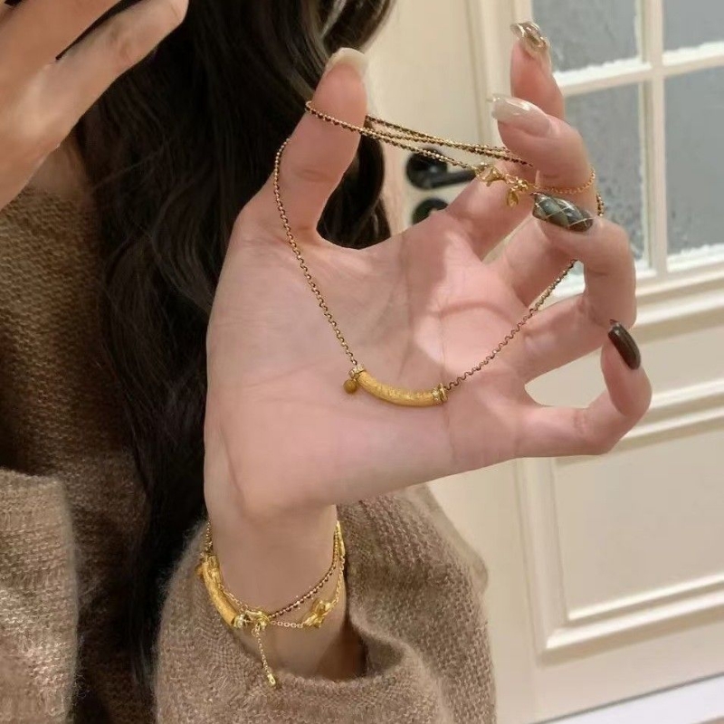 微笑虎眼石轻奢项链手链黑金色贵气小香风锁骨链吊坠配饰女友礼物