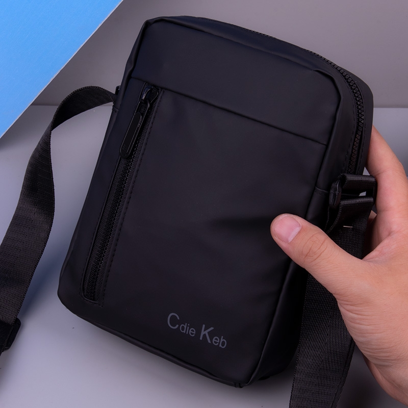 德国迷你斜挎包男单肩包男士手机包牛津布竖款小背包男款休闲通勤