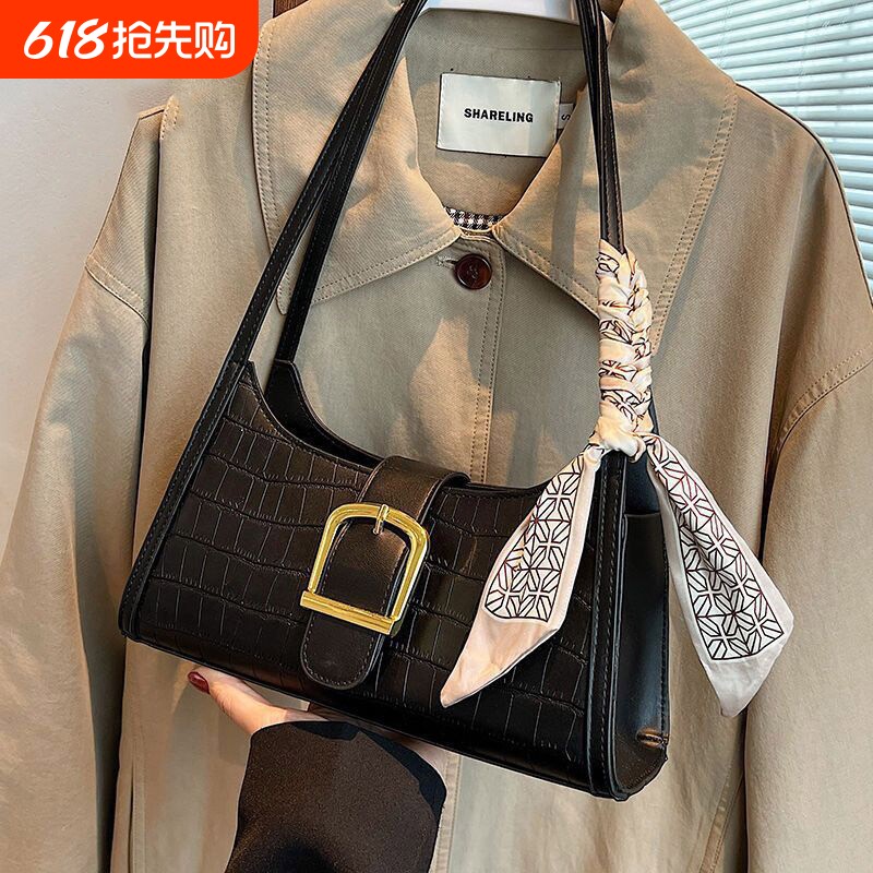 伊布古奇包包女2025新款真皮单肩腋下包高级感法棍包白色黑色休闲