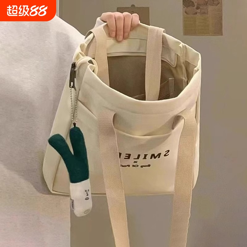 帆布包女托特包女2024新款大容量休闲百搭大学生通勤单肩包手提包