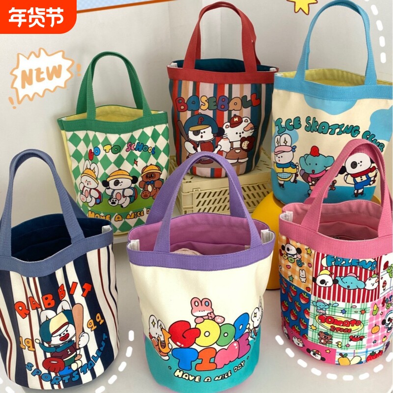可爱涂鸦水桶包ins印花圆筒包帆布便当袋韩风少女手拎饭盒妈咪包