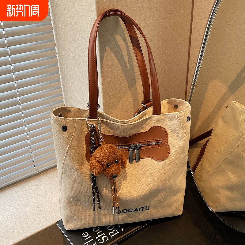 休闲大容量托特包包女新款轻便百搭通勤包帆布包多功能双肩包