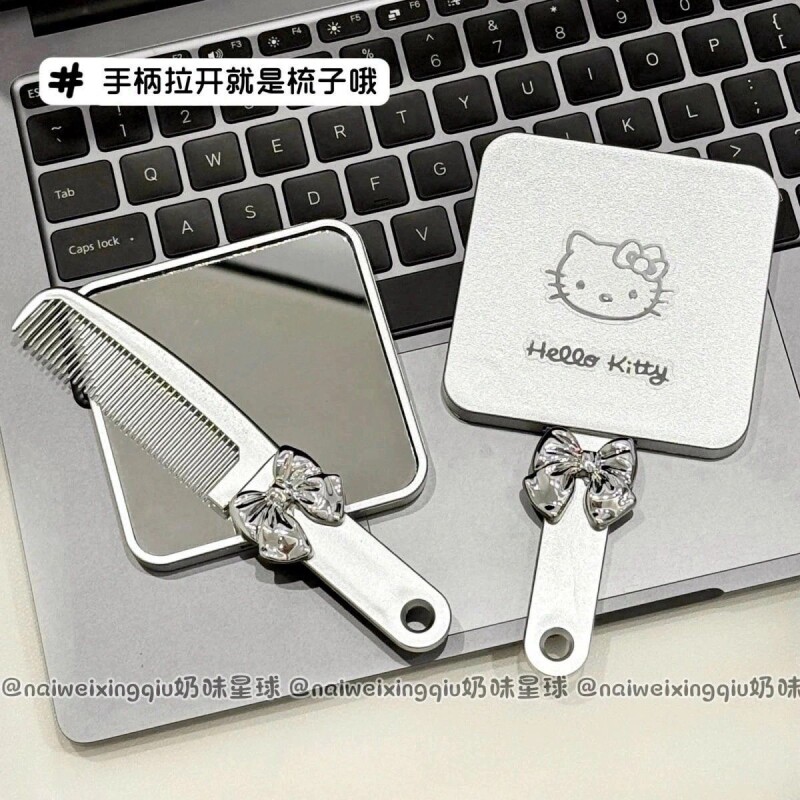 新款kitty猫手柄镜带梳子可爱ins便携补妆手持化妆镜梳一体小