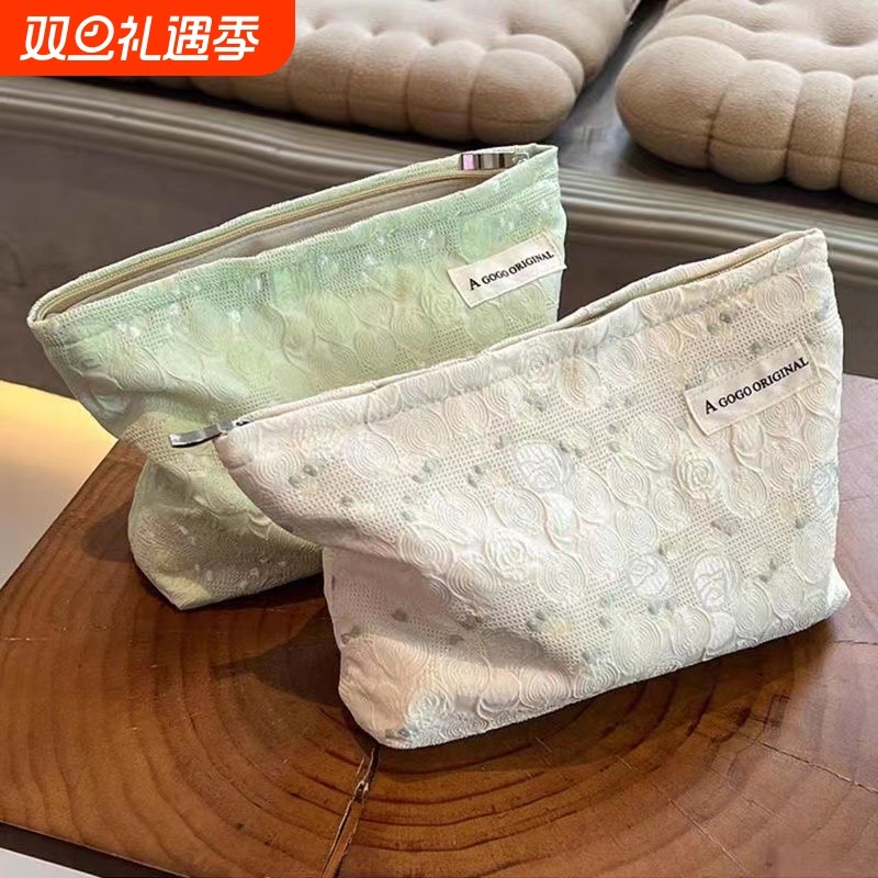 女生化妆包高级感ins便携高颜值化妆品收纳袋大容量手拿包新手工
