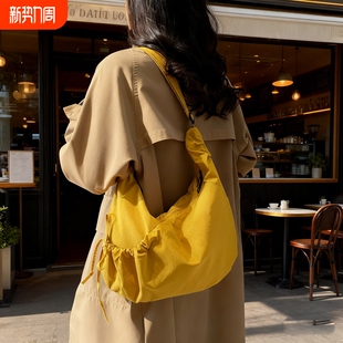 帆布包女大容量2026新款夏季百搭小众设计单肩斜挎包高级感饺子包