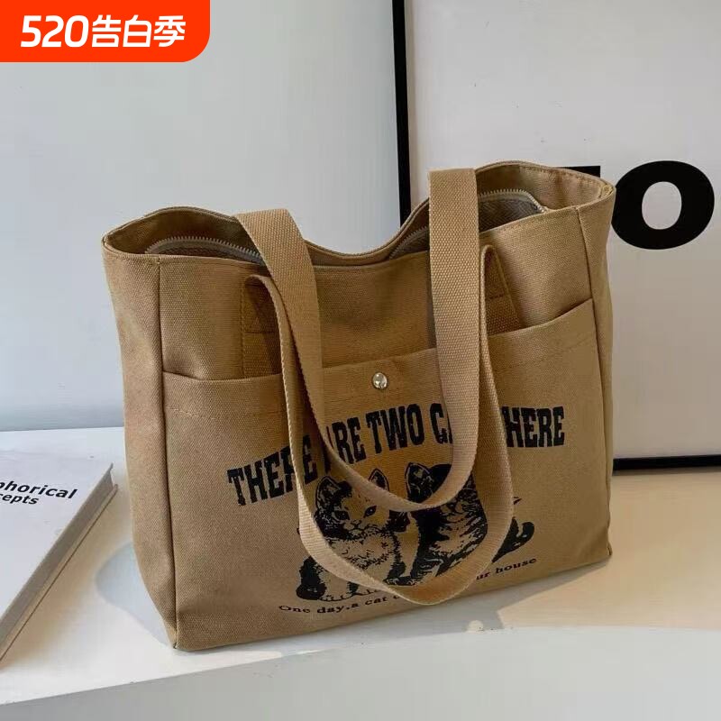帆布包包女2026新款时尚手提百搭单肩大容量通勤托特上课