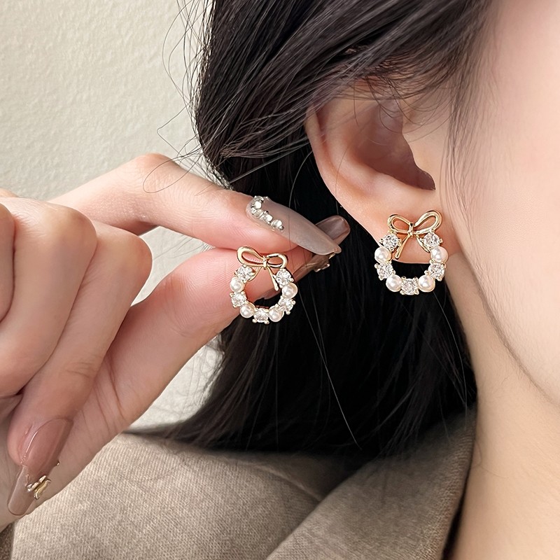蝴蝶结珍珠耳钉女2025年新款爆款高级感轻奢耳环925纯银针耳饰