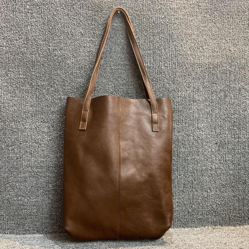 梦嘉丽头层牛皮手提腋下购物袋女