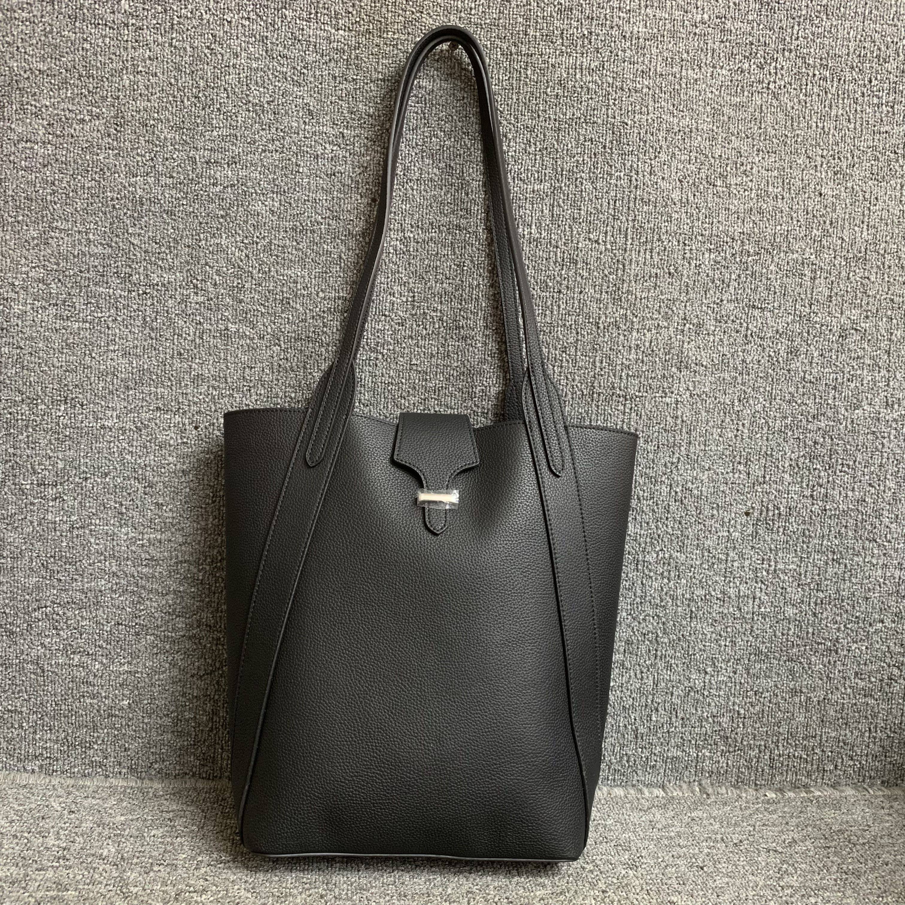 新品真皮女包小众韩版百搭时尚牛皮简约职业OL女手提腋下水桶包