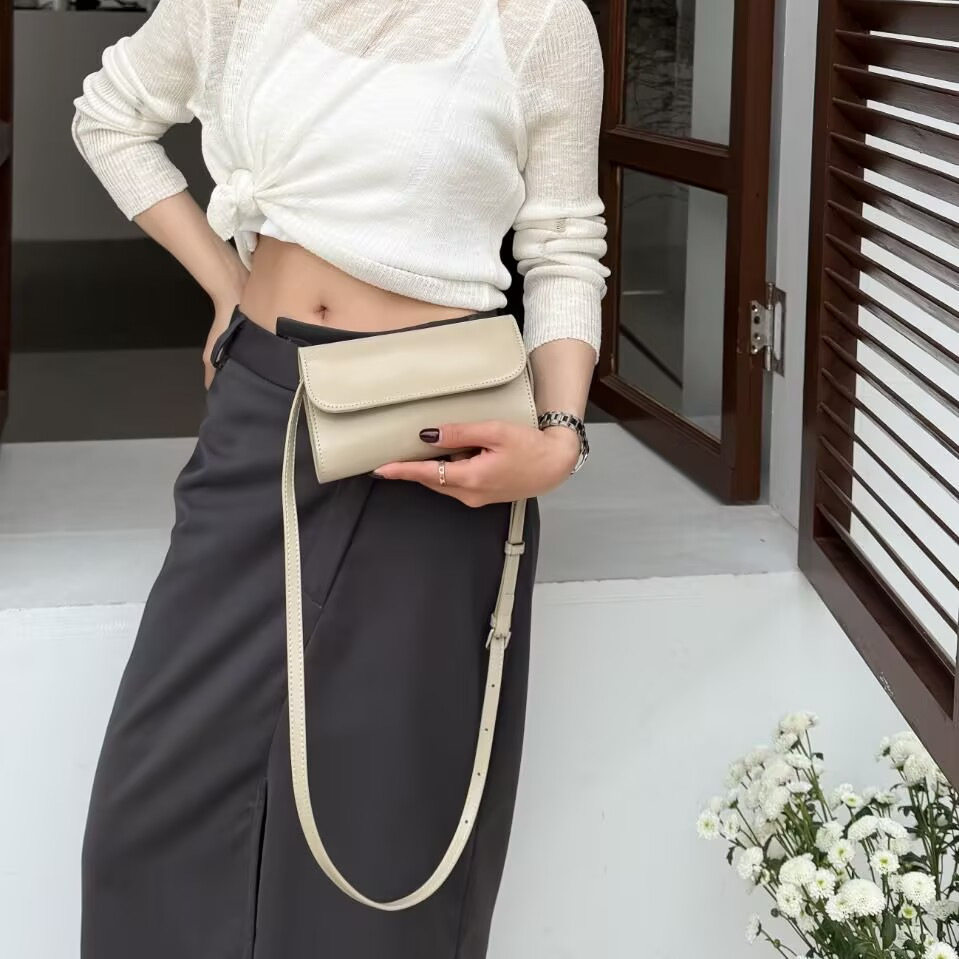 梦嘉丽牛皮女单肩手机包化妆包