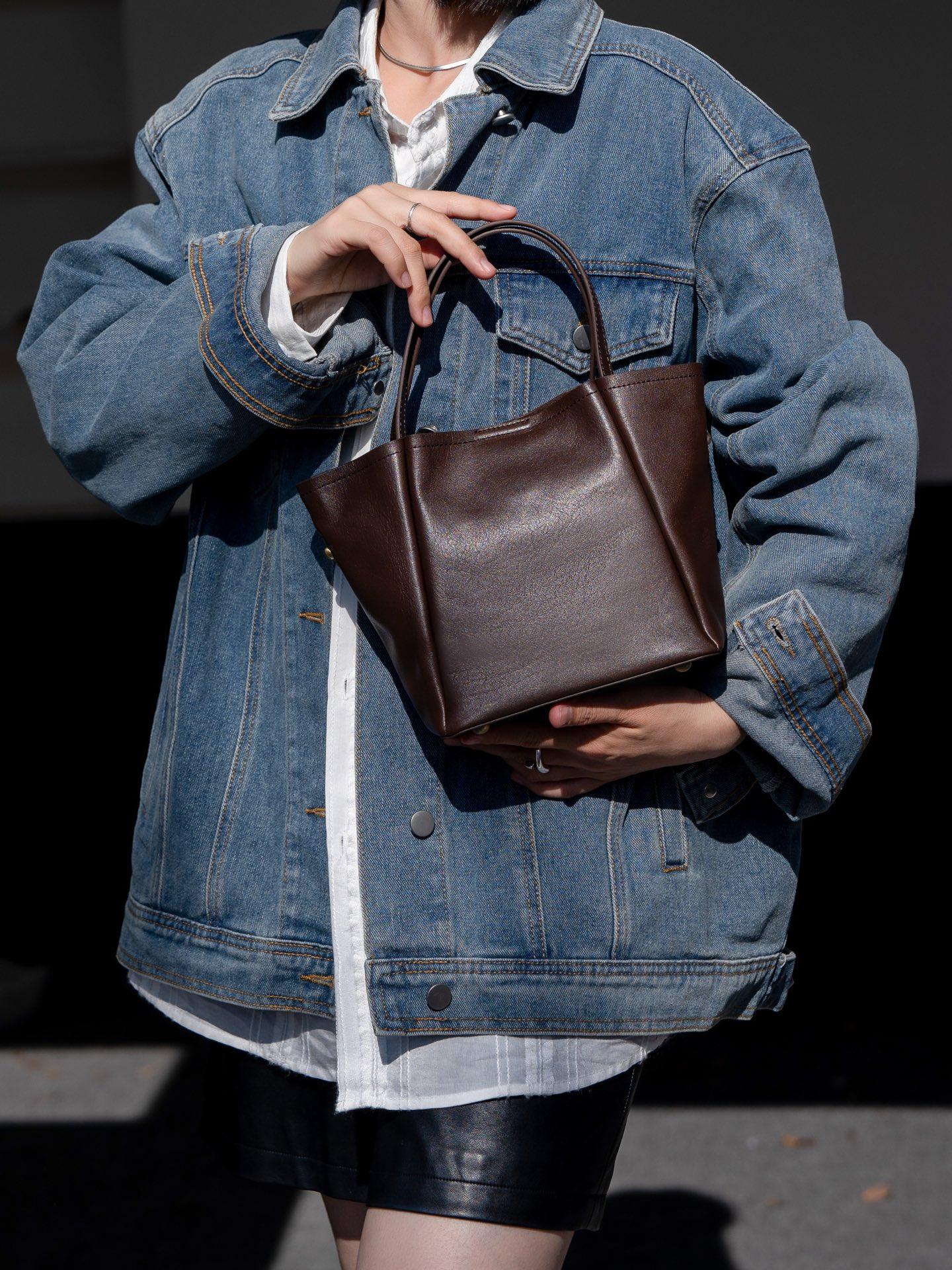 松弛慵懒风~~ 真皮女包复古百搭时尚头层树膏牛皮手提单肩水桶包,箱包皮具/热销女包/男包,水桶包,淘宝优惠券,粉丝福利购,淘宝优惠卷