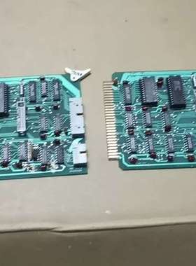 绿色PCB电路板，插槽接口完好。型号是PRI 板卡REV D