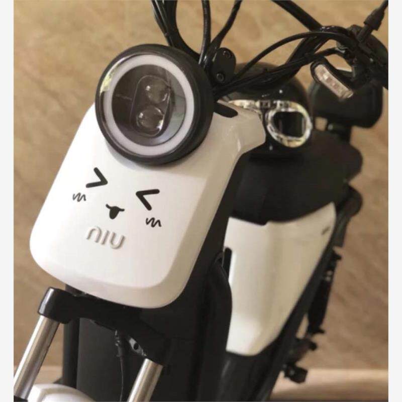 可爱笑脸表情小牛电动车