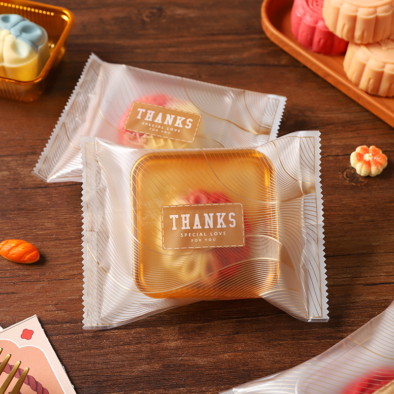 新款月饼包装袋冰皮50克75g带托广式流心蛋黄酥自封机封单独袋子