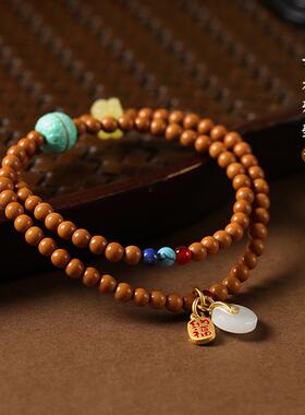2026国风橄榄核圆珠双圈手链女新中式设计文玩宝宝佛佛珠手串厂家