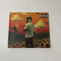 In Stock, Brand New and Authentic Tyler and the Creator Flower Boy Album Cd