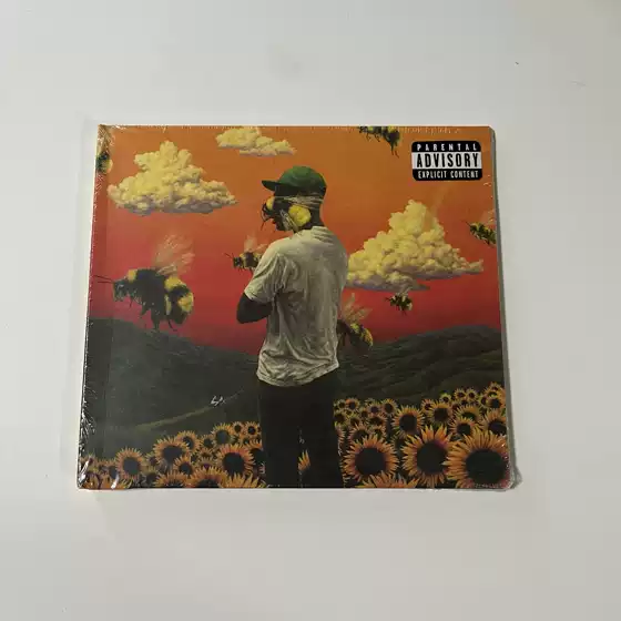 In Stock, Brand New and Authentic Tyler and the Creator Flower Boy Album Cd