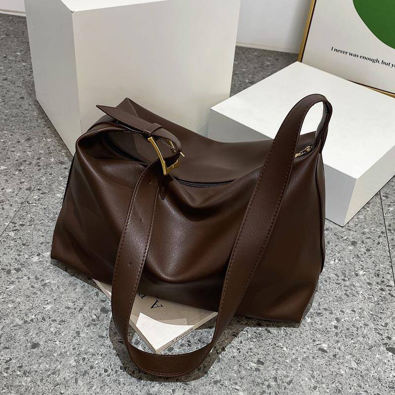 超火咖色手提托特包包女士2025新款流行高级感上班通勤单肩斜挎包