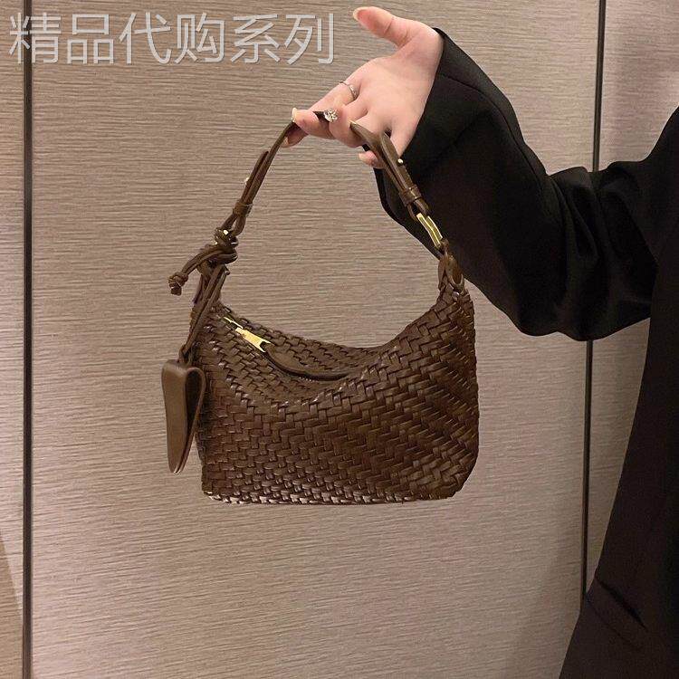 法国FMKDA编织饺子包女2025新款高级感手提饭盒包真皮单肩斜挎包